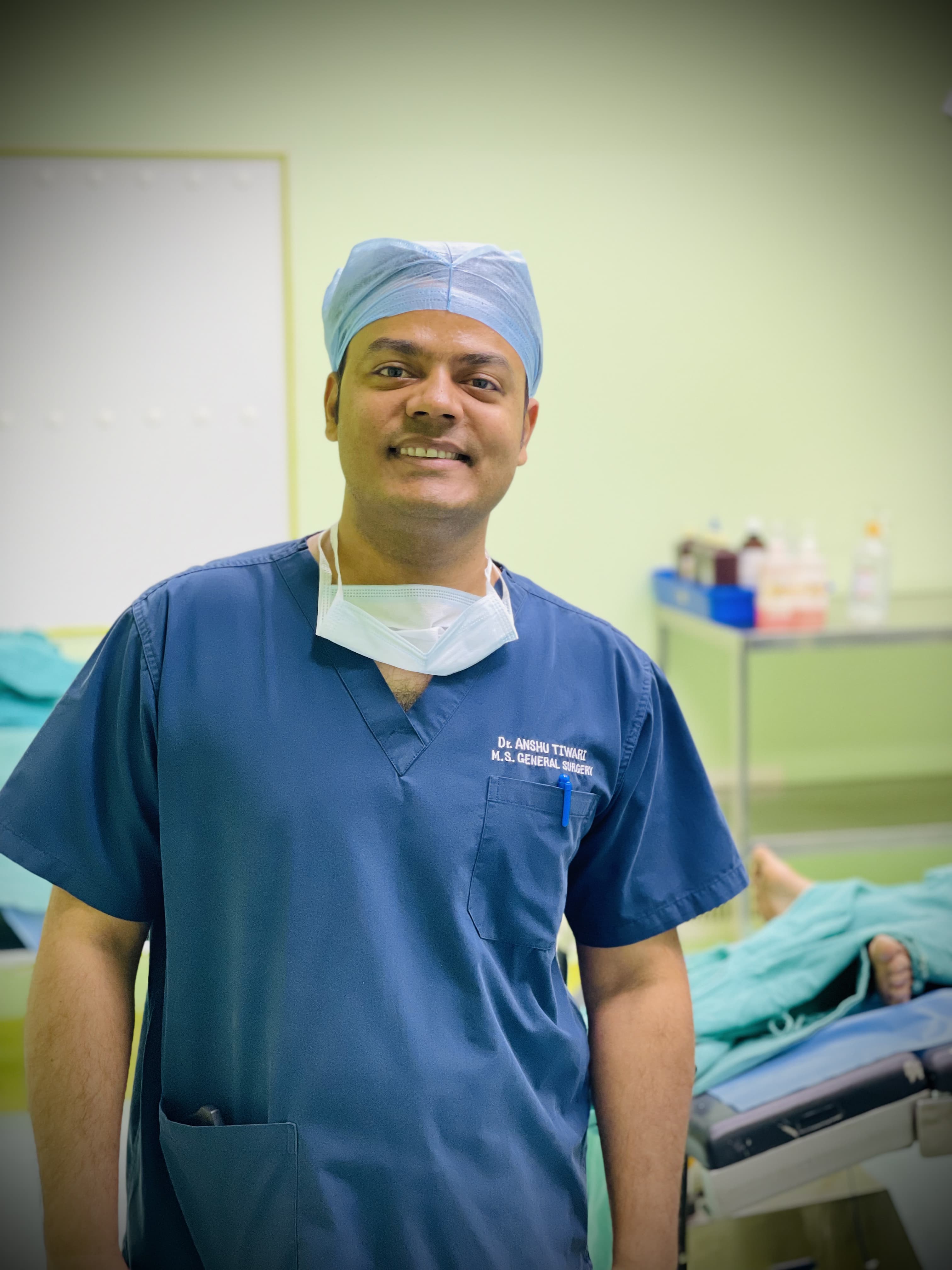 Dr. Anshu Kr. Tiwari, MS General Surgery, in operation theatre at O P Hospital