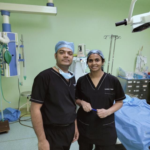 Dr. Anshu Kr. Tiwari and Dr. Anjali Tiwari together in the operation theatre at O P Hospital